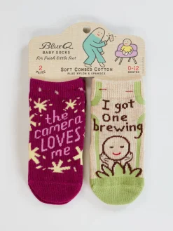 The Camera Loves Me/ I Got One Brewing Baby Socks
